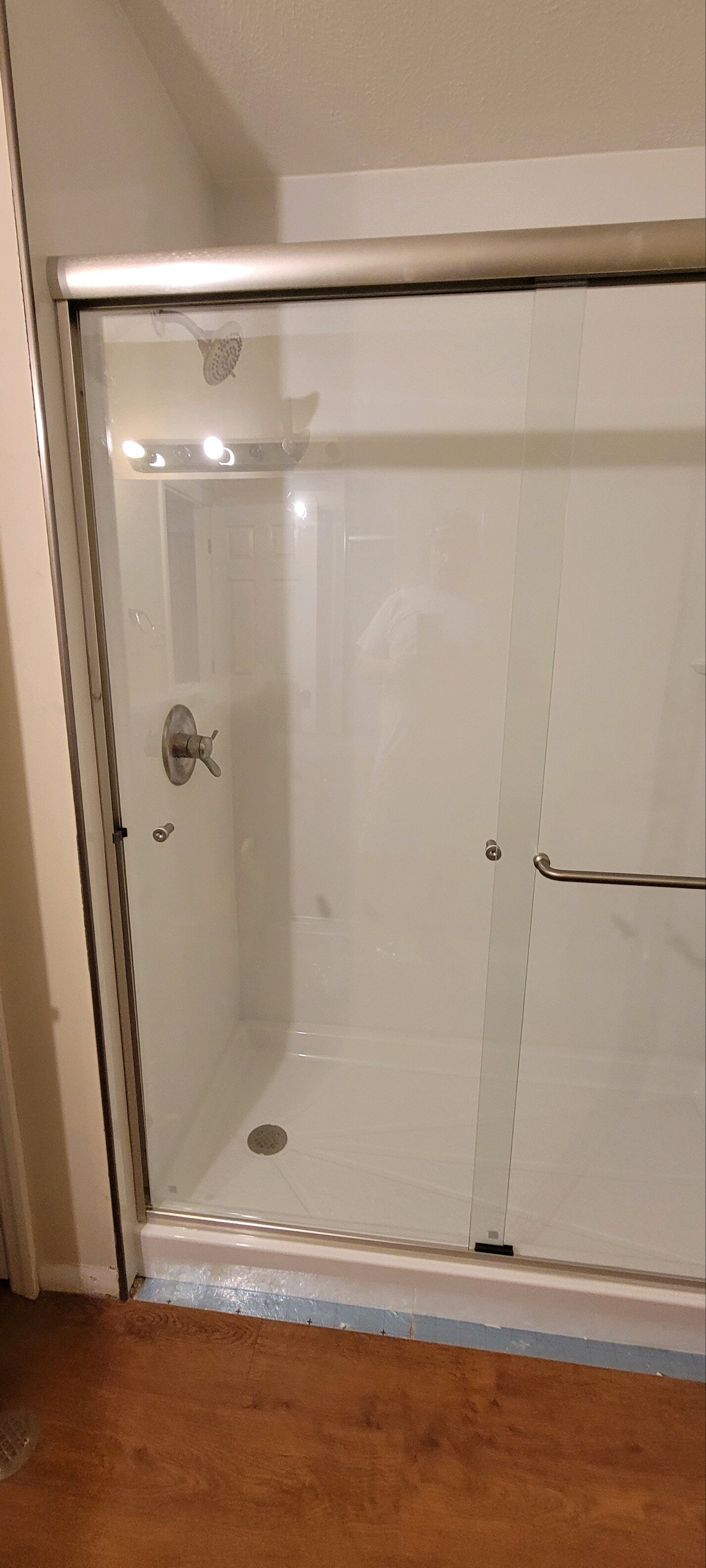 After, walk-in shower, white with sliding glass shower door